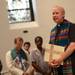 Fr. Dan Reim, of St. Mary's Student Parish addresses the audience during a prayer vigil in support of Camp Take Notice at the church on Thursday night.  Melanie Maxwell I AnnArbor.com